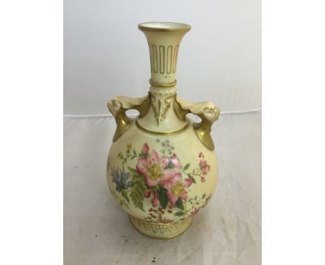 A Royal Worcester blush ivory twin-handled vase with floral decoration