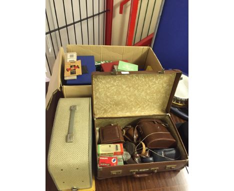 A quantity of photographic equipment to inc cameras (Ross), binoculars and slides, negatives, and slide projector etc