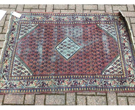 Persian carpet 152 x 105cm together with another Eastern rug 153 x 105cm (2)