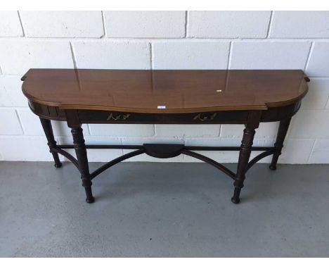 Edwardian Mahogany serpentine fronted console / hall table, two draws below, on turned legs with stretchers, 162cm width, 73c