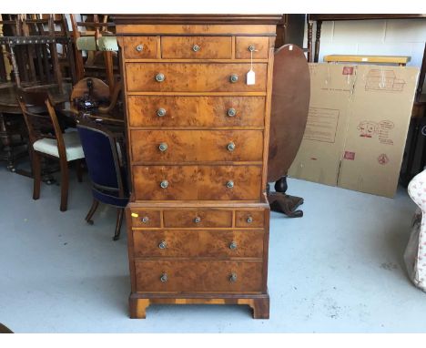 Reproduction Yew wood miniature chest on chest with an assortment of 12 draws, on bracket feet, 59cm width, 125cm height, 34c