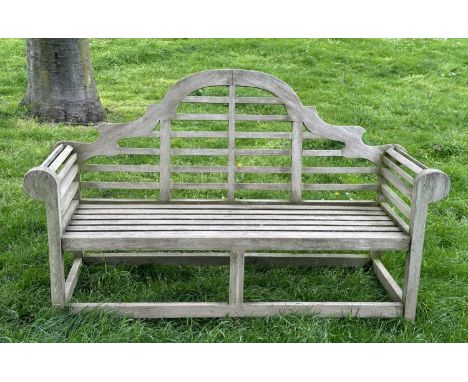 LUTYENS STYLE GARDEN BENCH, weathered teak slatted after a design by Sir Edwin Lutyens, 160cm W. 