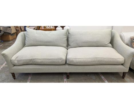 SOFA, three seater, light green upholstery on turned wood supports, 250cm L x 81cm H x 100cm D. 