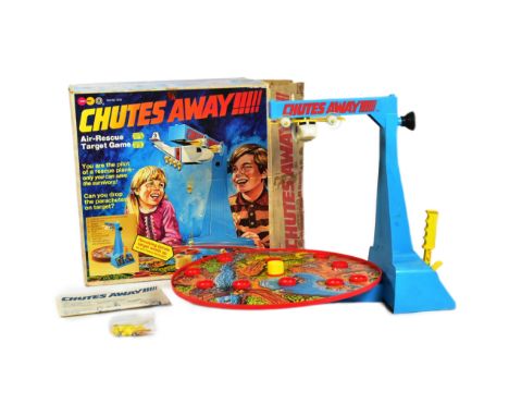 Board Games - a vintage 1970s (1977) Marx Toys Chutes Away table top air rescue target game. The game containing the base, li