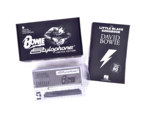 A Limited Edition David Bowie Stylophone along with the David Bowie little black song book. Contents appearing unused with in