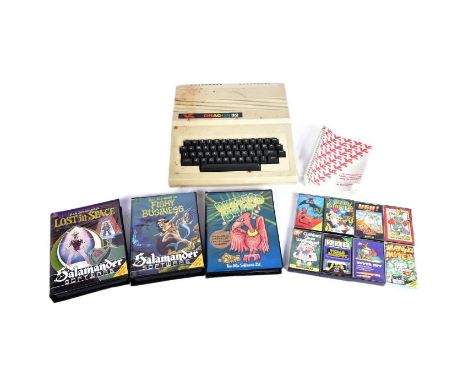 Retro Gaming - a vintage 1980s Dragon Data made Dragon 32 home computer console along with a selection cartridge games to inc
