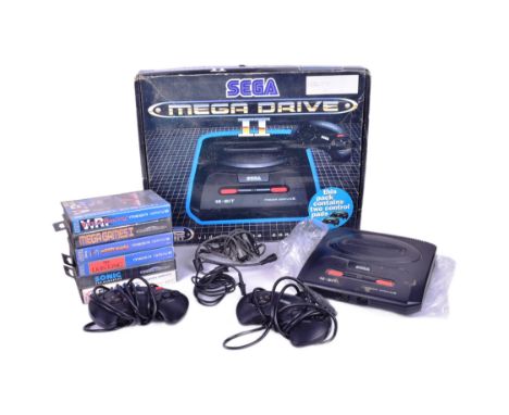 Retro Gaming - an original vintage Sega made 16-bit Mega Drive II video game console with x6 games. Games to include; Mickey 