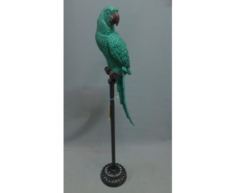 A Contemporary fibreglass model of a parrot, raised on metal stand, H. 119 cm 