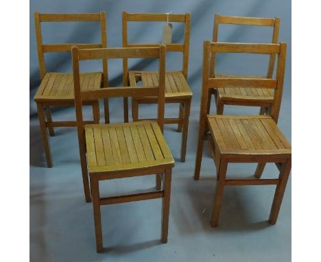 A set of five vintage oak child's chairs 