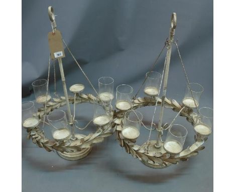 A pair of Contemporary tea light holders, H.79cm 