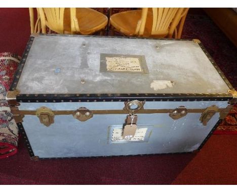 A leather bound metal trunk, H.52 W.100cm 
