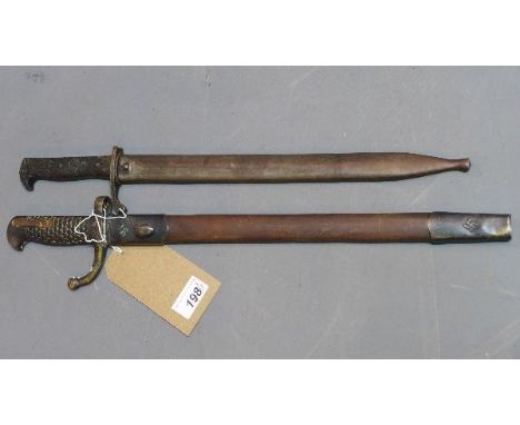 Two Third Reich style bayonets, one in scabbard bearing swastika and marked 'Bolangning' and having eagle feather design hand