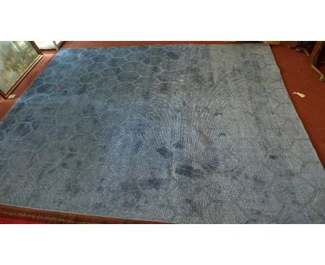 A hand knotted wool viscose Bhadohi carpet, on a blue ground, 306 x 240 cm 