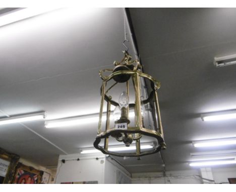 A BRASS HANGING LANTERN