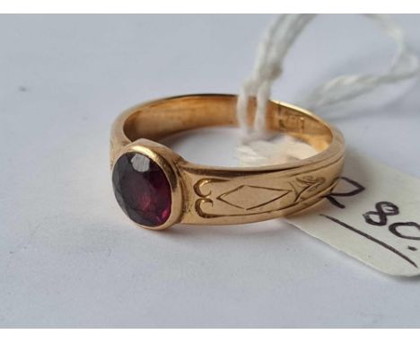 A antique single stone ruby ring set in engraved mount 18ct gold size Q  - 5 gms 