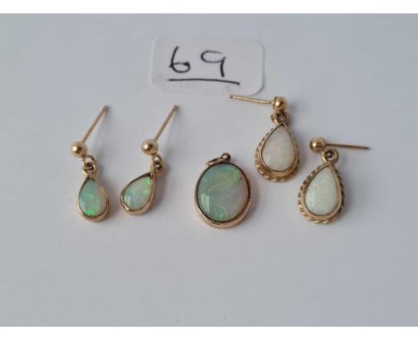 A opal pendant and two pairs of earrings - all 9ct gold