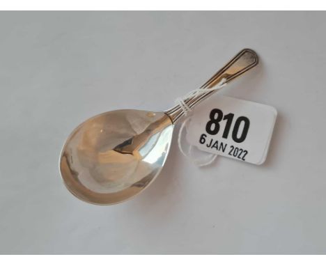 A George III caddy spoon with reeded stem - London 1801 by script JW