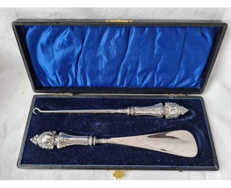 A box set of silver handled shoes and button hook - Birmingham 1905