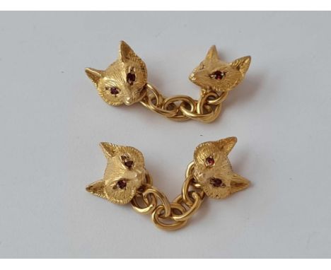 A PAIR OF FINE RUBY EYED FOX HEAD CUFFLINKS IN HIGH 9CT - 6.2 GMS