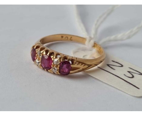 A ruby and diamond seven stone ring 18ct gold size N 1/2 - 3.1 gms 