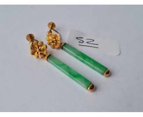 A pair of vintage gold and jade earrings 