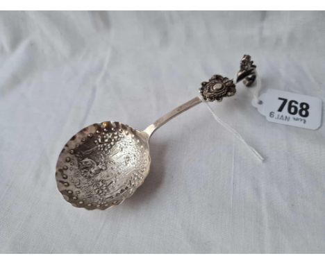 A Dutch caddy spoon with embossed bowl - import mark for 1908 