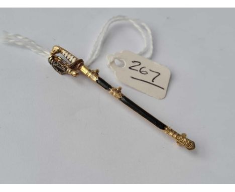 A gold and enamel sword brooch 15ct gold - 3.7 gms 