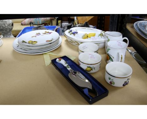 Royal Worcester Evesham pattern, oval tureen and lid, three ramekins, two dinner plates, four side plates, mug, jug and cake 