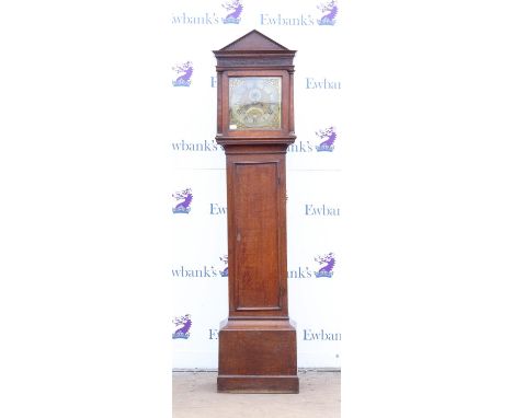 Early 19th century eight day oak longcase clock, the triangular hood with blind fret carved frieze enclosing a brass dial wit