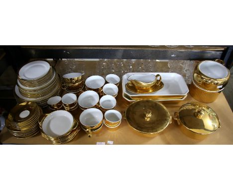 Royal Worcester gilt and white part dinner service for eight, includes tureens and serving dishes