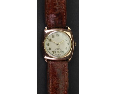 A 9ct rose gold cased wristwatch, the white enamelled dial with applied gilt metal Arabic numerals, with subsidiary seconds d