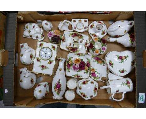 A mixed collection of Royal Albert old country roses to include mantle clock, ornamental animals, trinklet boxes, posy basket