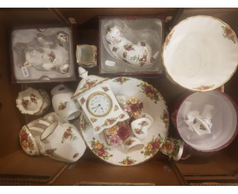 A mixed collection of Royal Albert old country roses to include boxed aniamls, mantle clock large bowl, lidded boxes, planter