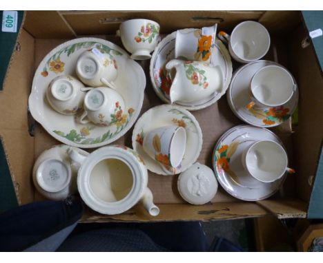 A collection of Art Deco New Hall Manley tea and dinner ware items to include tea cups, saucers, serving plate, side plates e