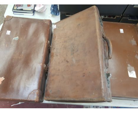Three pieces of vintage luggage to include 1 leather case initialled GBT, largest 66cm x 40cm, one handle a/f (3). 