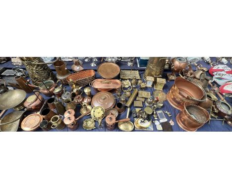 A large quantity of copper and brass including coal scuttles, fish kettles, measures, Starboard lamp, telescope, carriage clo