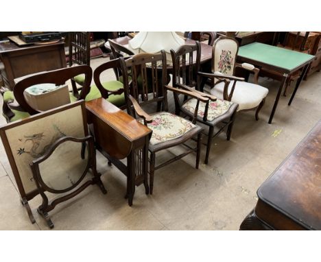 A pair of Edwardian mahogany elbow chairs together with a Sutherland table, fire screen, toilet mirror, folding card table an