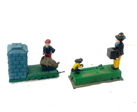 Two vintage cast iron money boxes 
