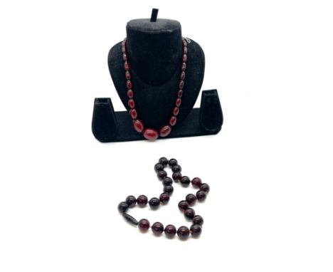Vintage cherry red amber bakelite beads weigh approx 34 grams with internal streaking and another neck lace weighs 51 grams 