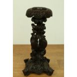 India, a Anglo-Colonial hardwood richly carved open worked candle stand, 19th century.