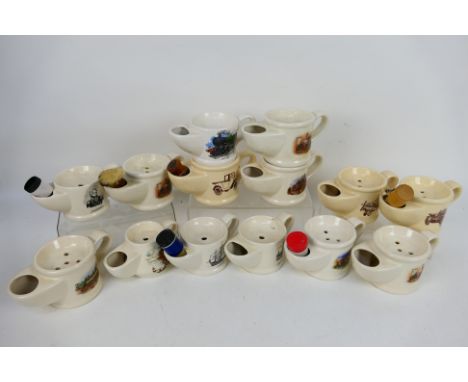 A collection of vintage shaving mugs, predominantly Wade, with images of trains, ships, Nelson and other. [W]
PLEASE NOTE: AL