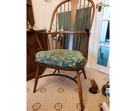 Ercol - A Chairmakers, double bow, comb-back Windsor armchair. [W]

NOTE: ITEMS ARE LOCATED IN THE WA4 POSTCODE AREA, THE SUC