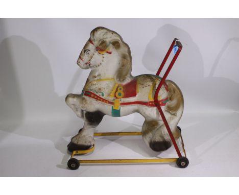 Mobo - A mid century Mobo child's push along tinplate horse. It measures 48 x 54 x 28 cm and appears in Fair to Good original