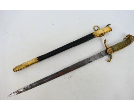 Pattern 1891 Midshipman's dirk, with long mane lion head brass pommel, the guard with crowned, fouled anchor and acorn finial