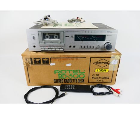 Rotel - Stereo Cassette Deck. A boxed Rotel RD-500 with manual, coax cable, RCA cable and attached RCA cables for in / out. U