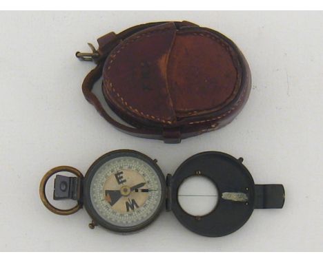 A World War I brass prismatic marching compass by Dixon & Hempenstall of Dublin, inscribed  "A. F. Young  14th. Cheshires", i