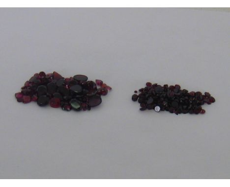 A quantity of loose polished garnets, total weight approx 142.28cts.  VAT will be added to the hammer on this lot.
