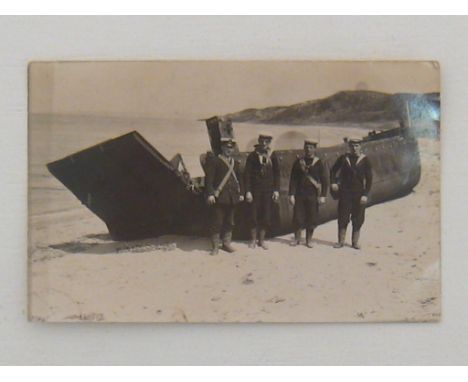 Royal Navy:- A group of 132 R/P postcards (1 cut down, several with creases), 3 photos of postcard size including a Naval fir