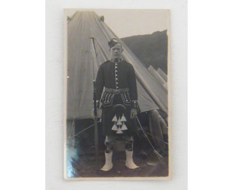 The Scottish Regiments:- An interesting group comprising a glazed and framed photo, a small format photo, 2 portrait photos, 