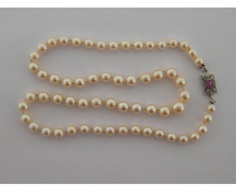 A single strand cultured pearl necklace, composed of 62 graduated pearls 6.2 - 8.8mm, 51cm long, to an 18 carat white gold, d